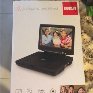 Brand new 9 inch portable DVD player never used!!